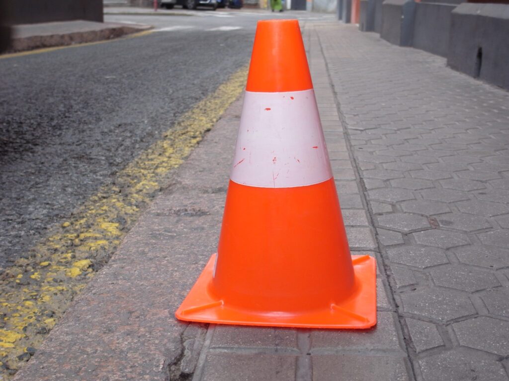 Orange traffic cone on a roadway